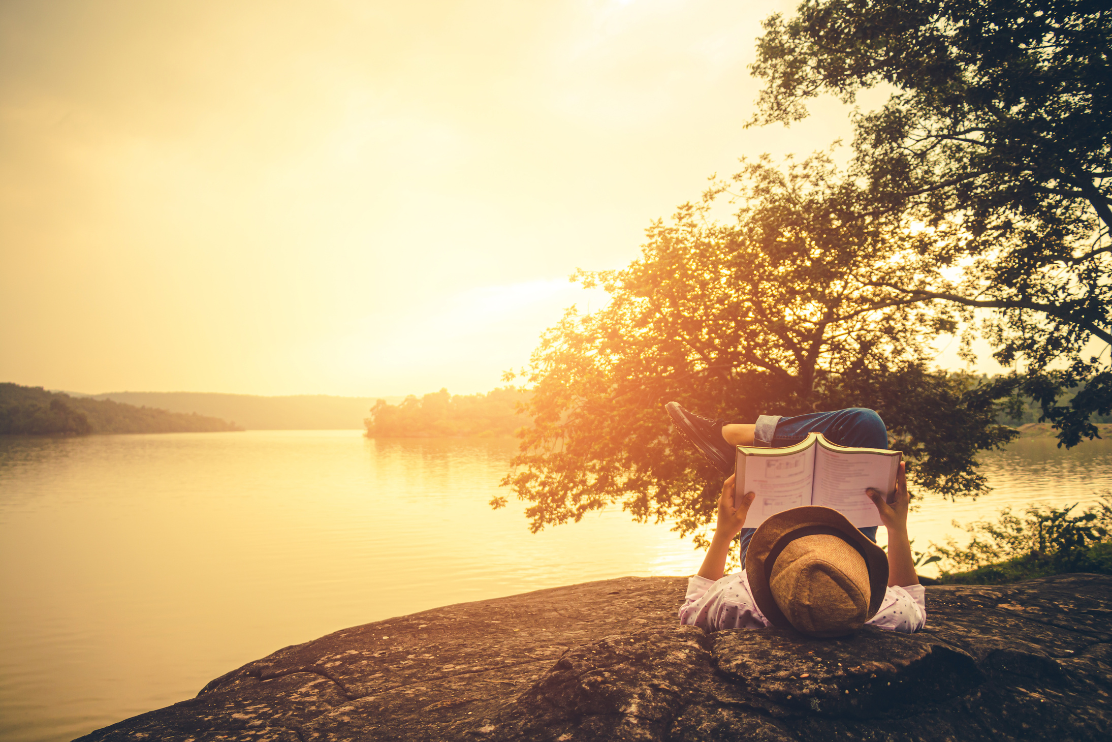 Women read books in quiet nature, concept read a books.